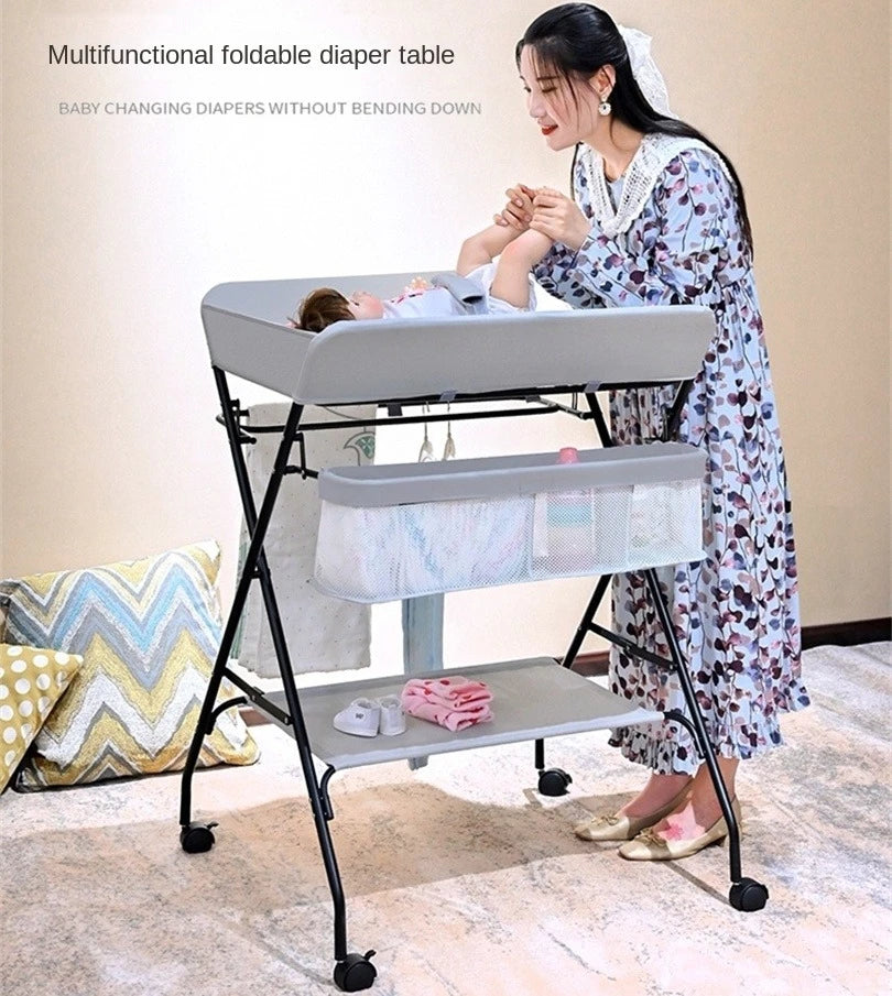 Baby Folding Portable Changing Table Diaper Changing Station Table With Side Basket for Nursery with Safety Belt And Storage Bag